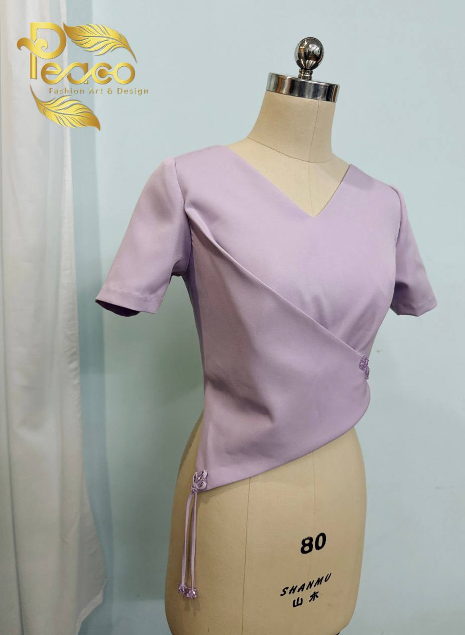 Asymmetric Wrap Blouse with Tassel Detail