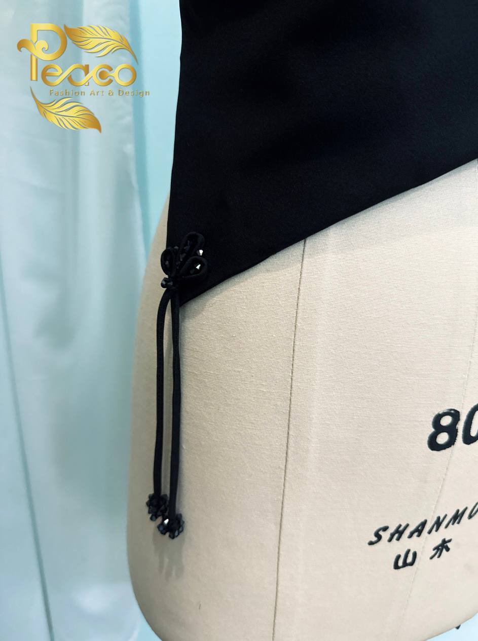 Asymmetric Wrap Blouse with Tassel Detail