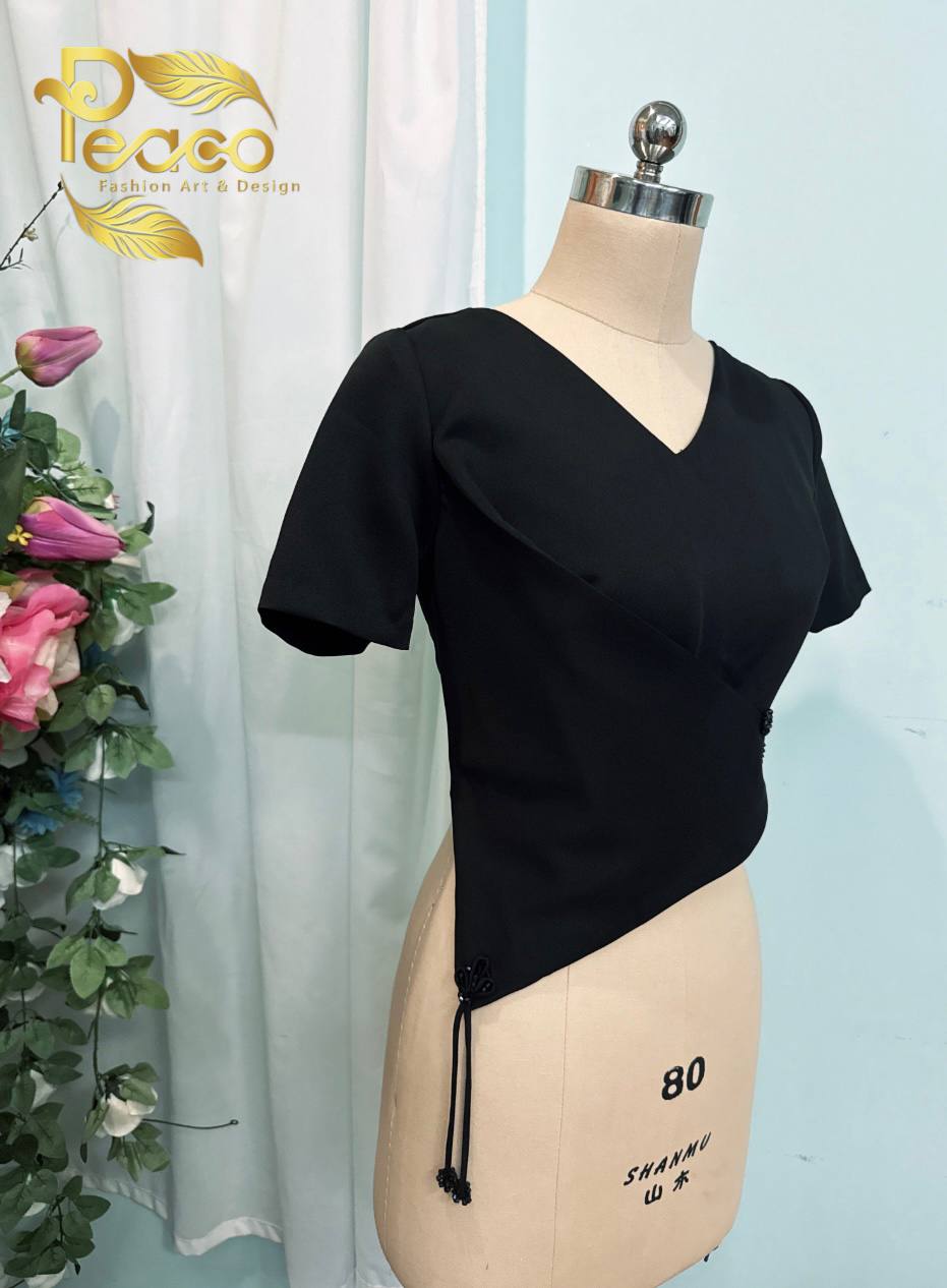 Asymmetric Wrap Blouse with Tassel Detail