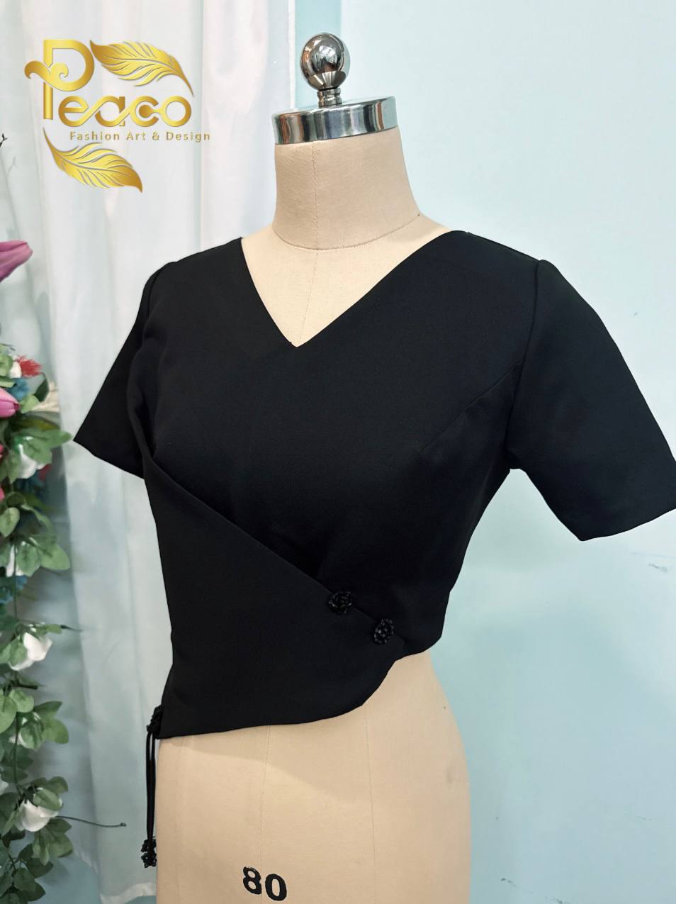 Asymmetric Wrap Blouse with Tassel Detail