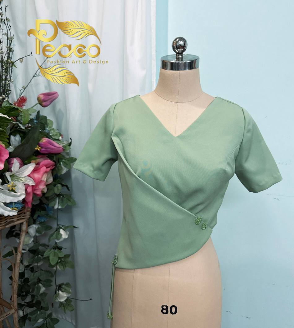 Asymmetric Wrap Blouse with Tassel Detail