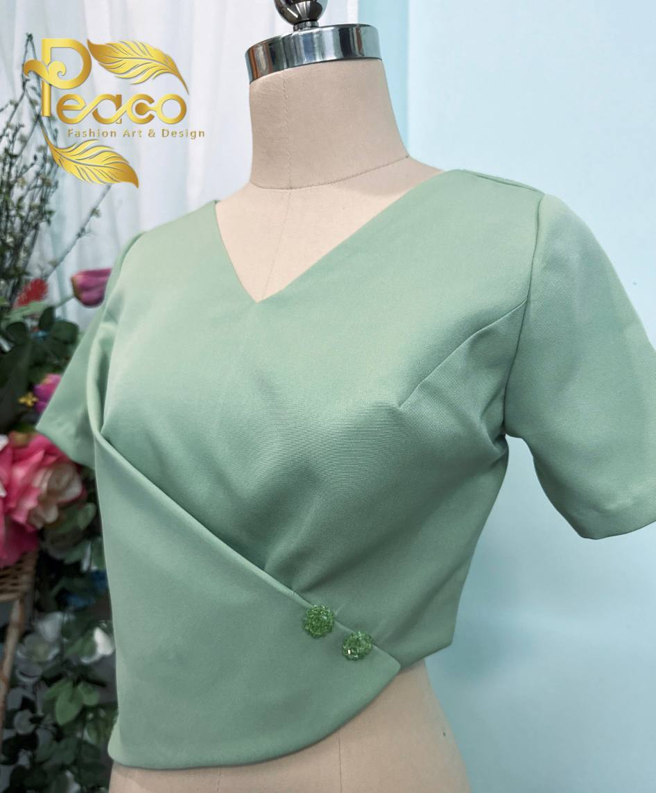 Asymmetric Wrap Blouse with Tassel Detail