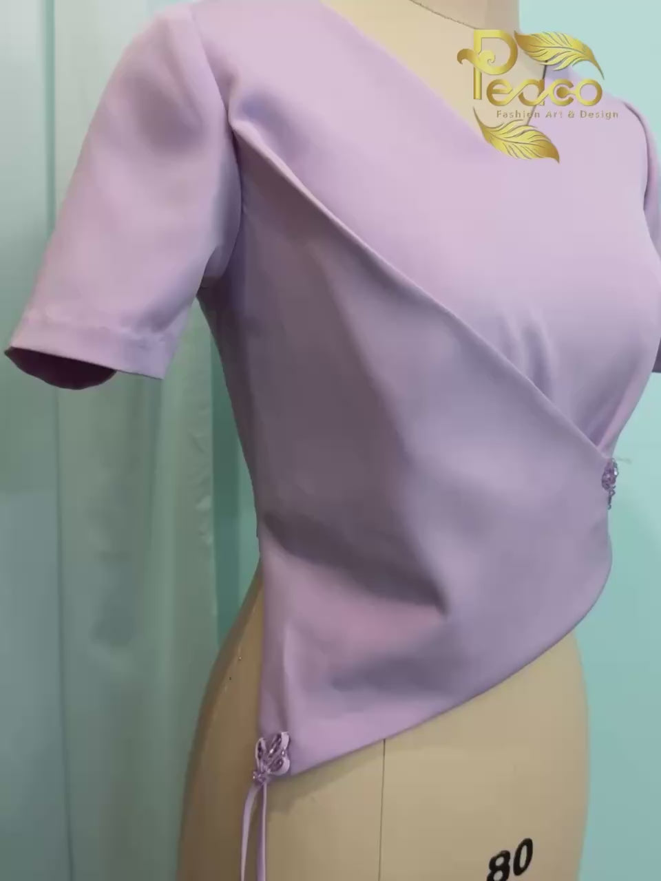Asymmetric Wrap Blouse with Tassel Detail