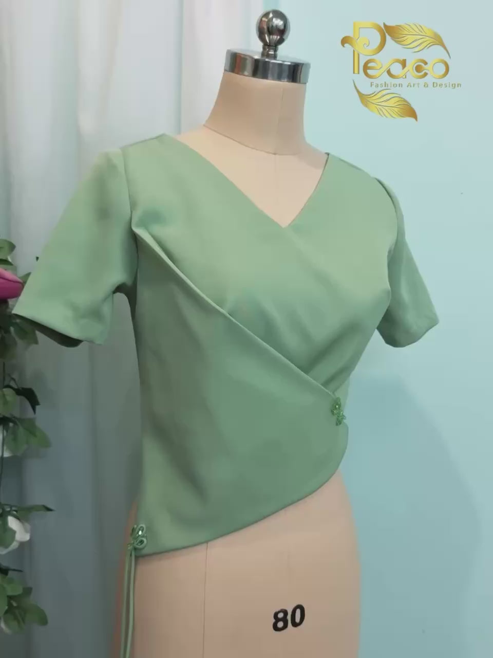 Asymmetric Wrap Blouse with Tassel Detail